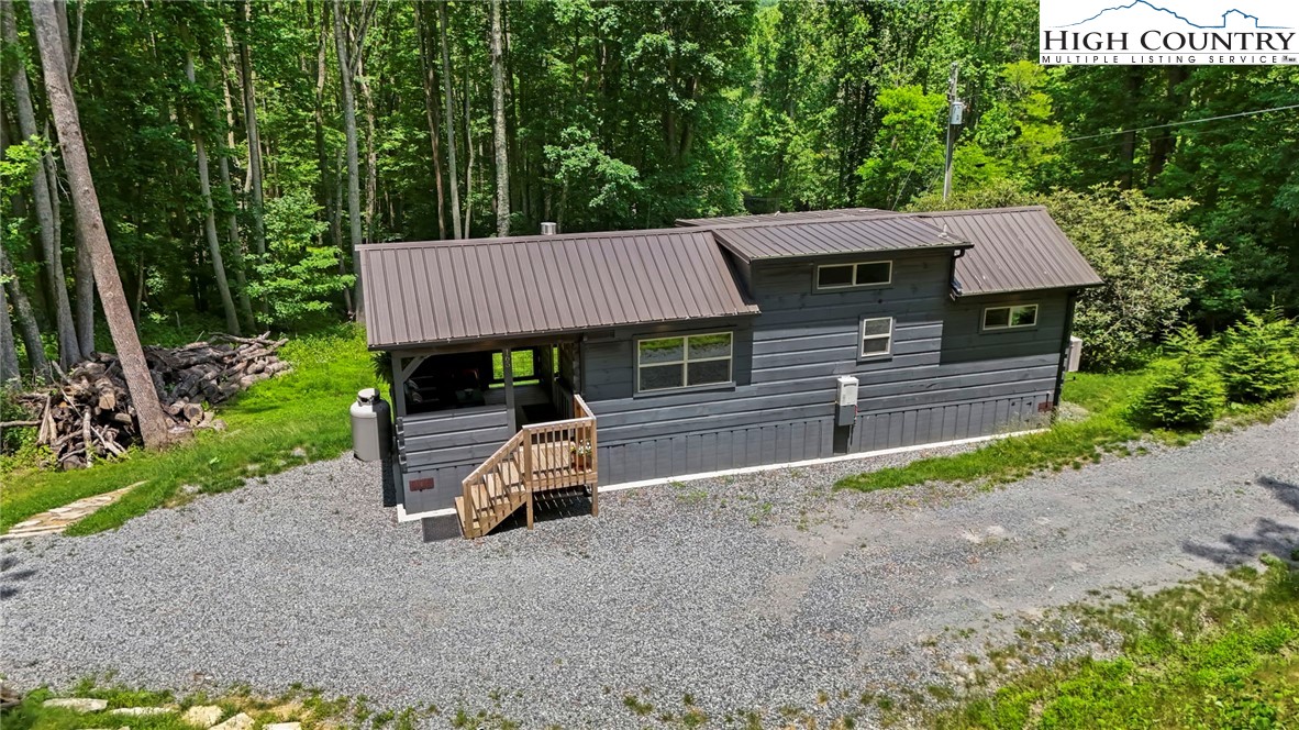 165 John Dotson Road Boone, NC 28607 - Photo 2 of 50 front view of a house with a yard