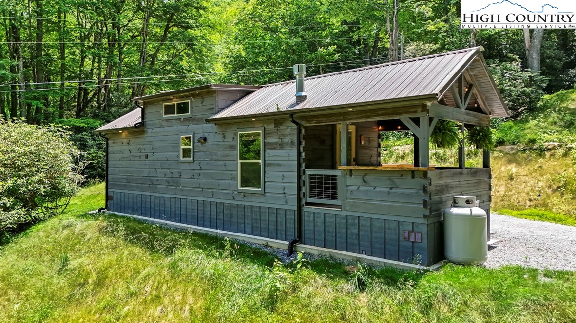 165 John Dotson Road Boone, NC 28607 - Photo 3 of 50 a view of a barn house
