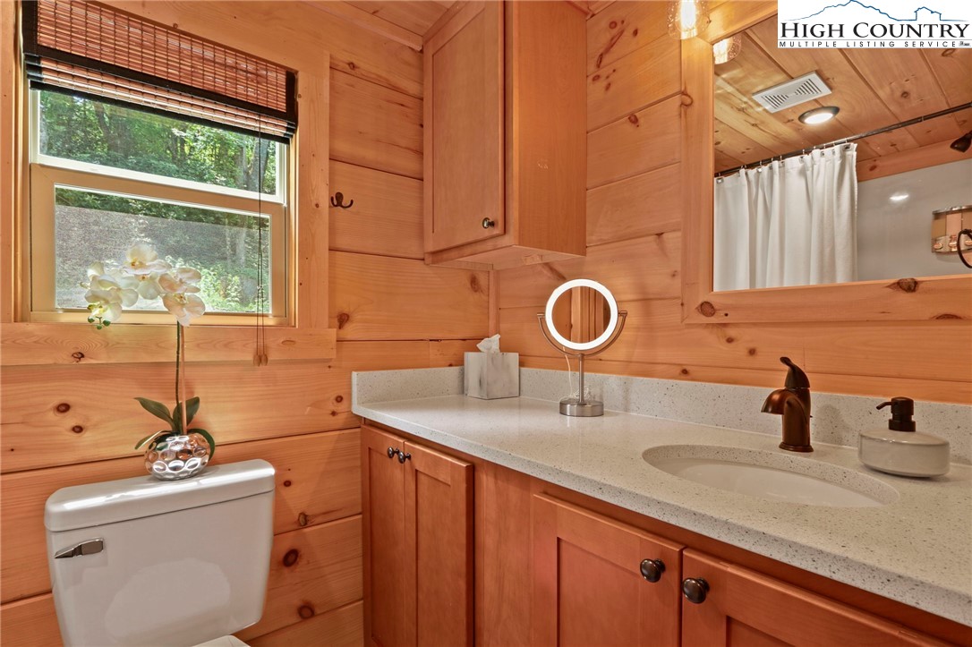 165 John Dotson Road Boone, NC 28607 - Photo 37 of 50 a bathroom with a sink and a mirror