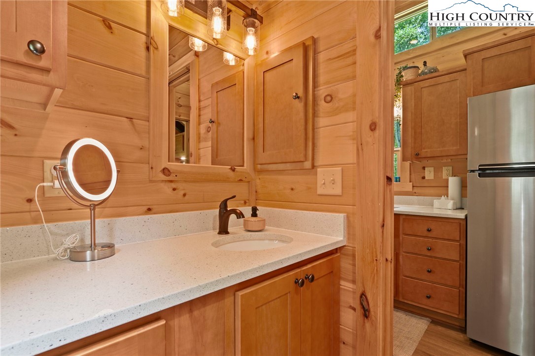 165 John Dotson Road Boone, NC 28607 - Photo 39 of 50 a bathroom with a sink and a mirror