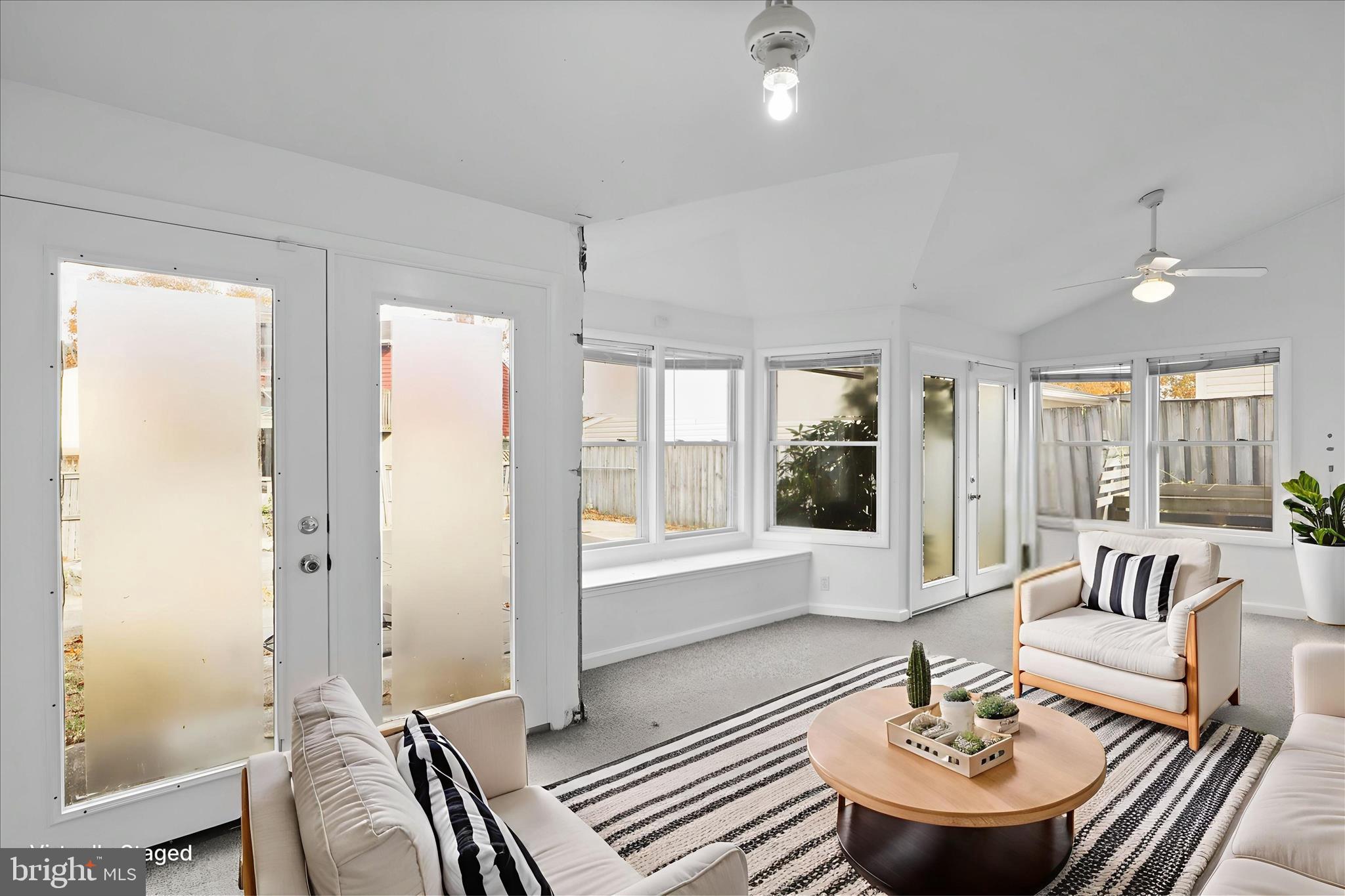 112 Main Avenue Southeast Glen Burnie, MD 21061 - Photo 21 of 45 a living room with furniture and a large window