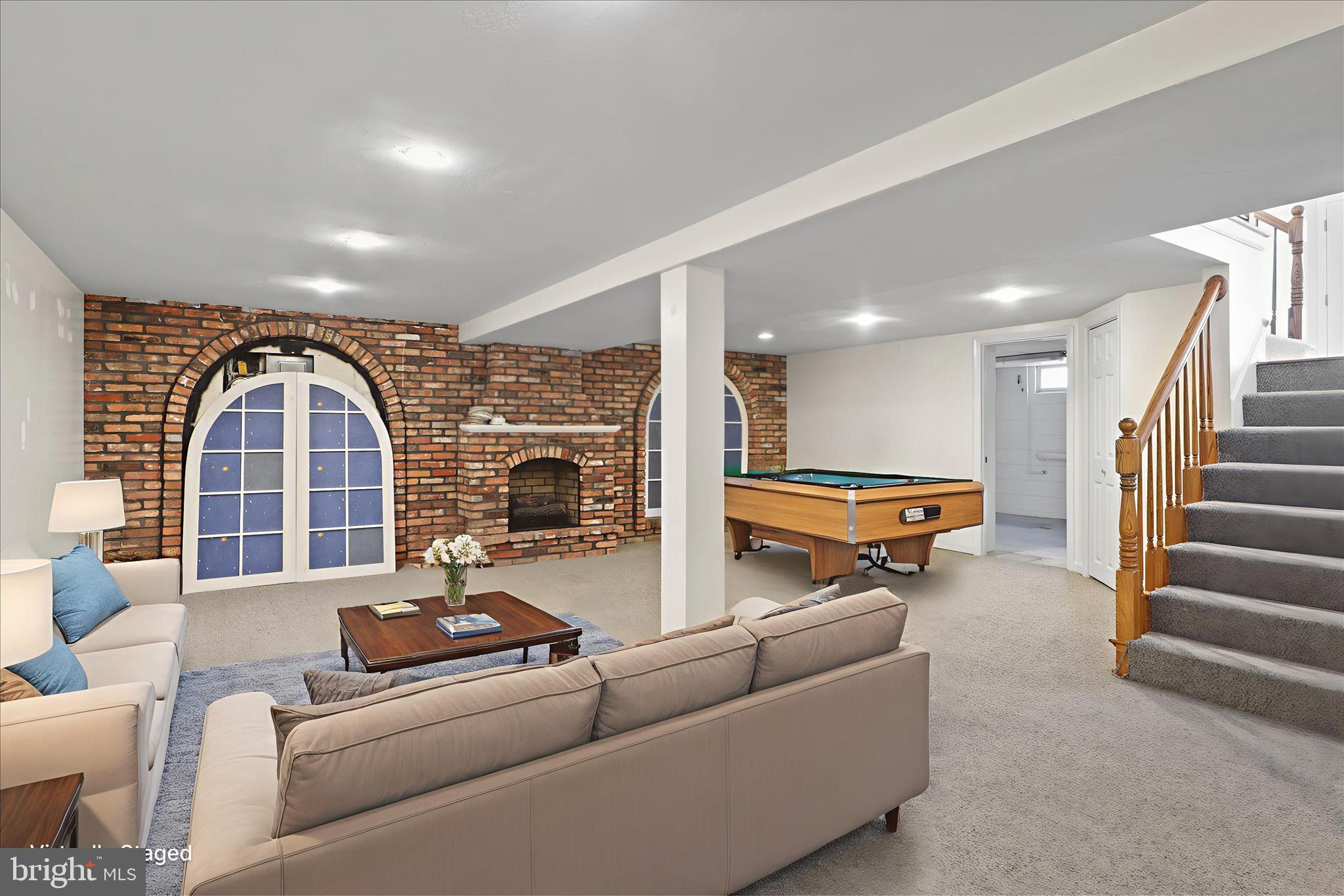 112 Main Avenue Southeast Glen Burnie, MD 21061 - Photo 24 of 45 a living room with furniture and a fireplace