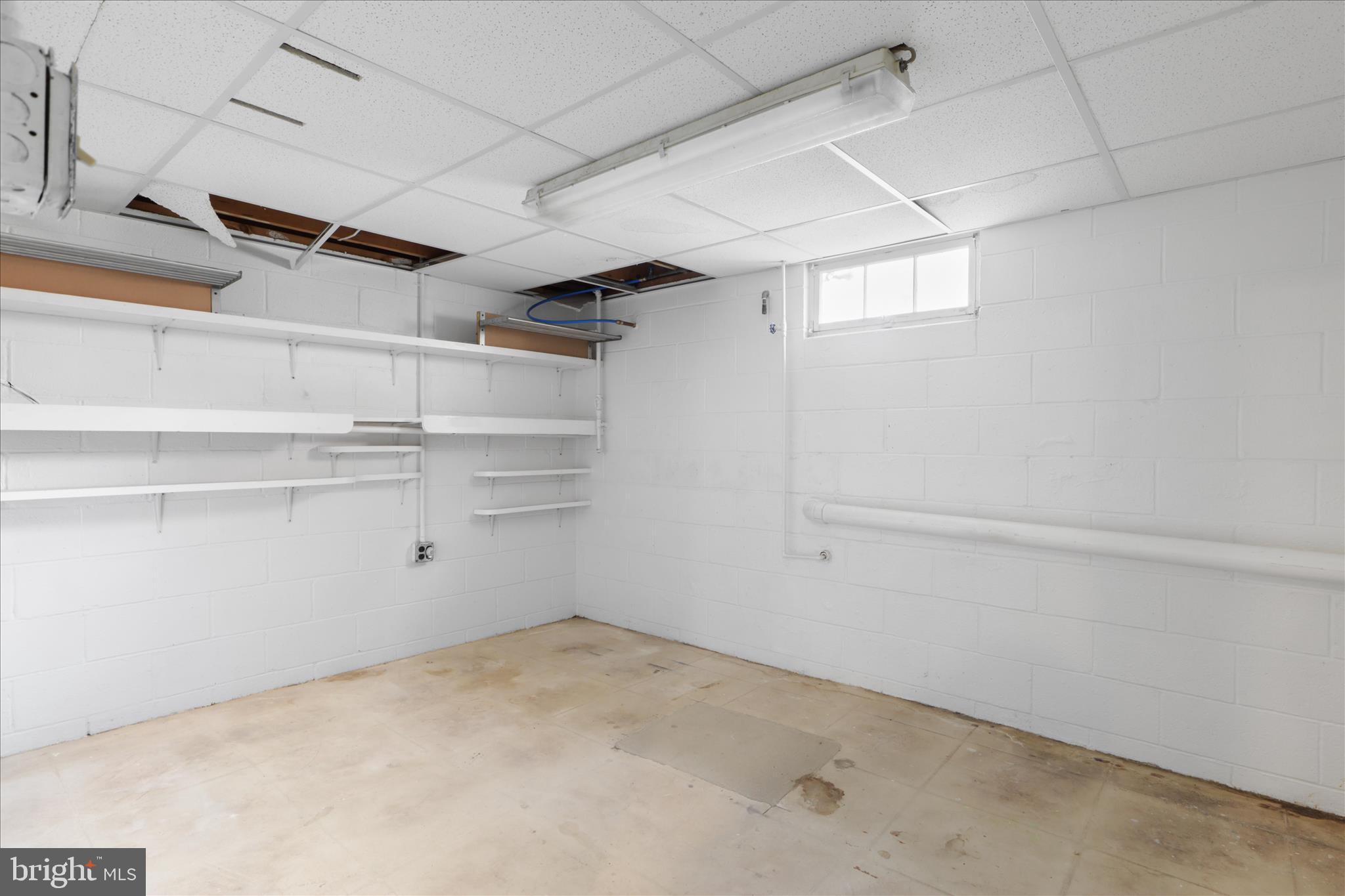 112 Main Avenue Southeast Glen Burnie, MD 21061 - Photo 29 of 45 a view of a room with racks on the wall