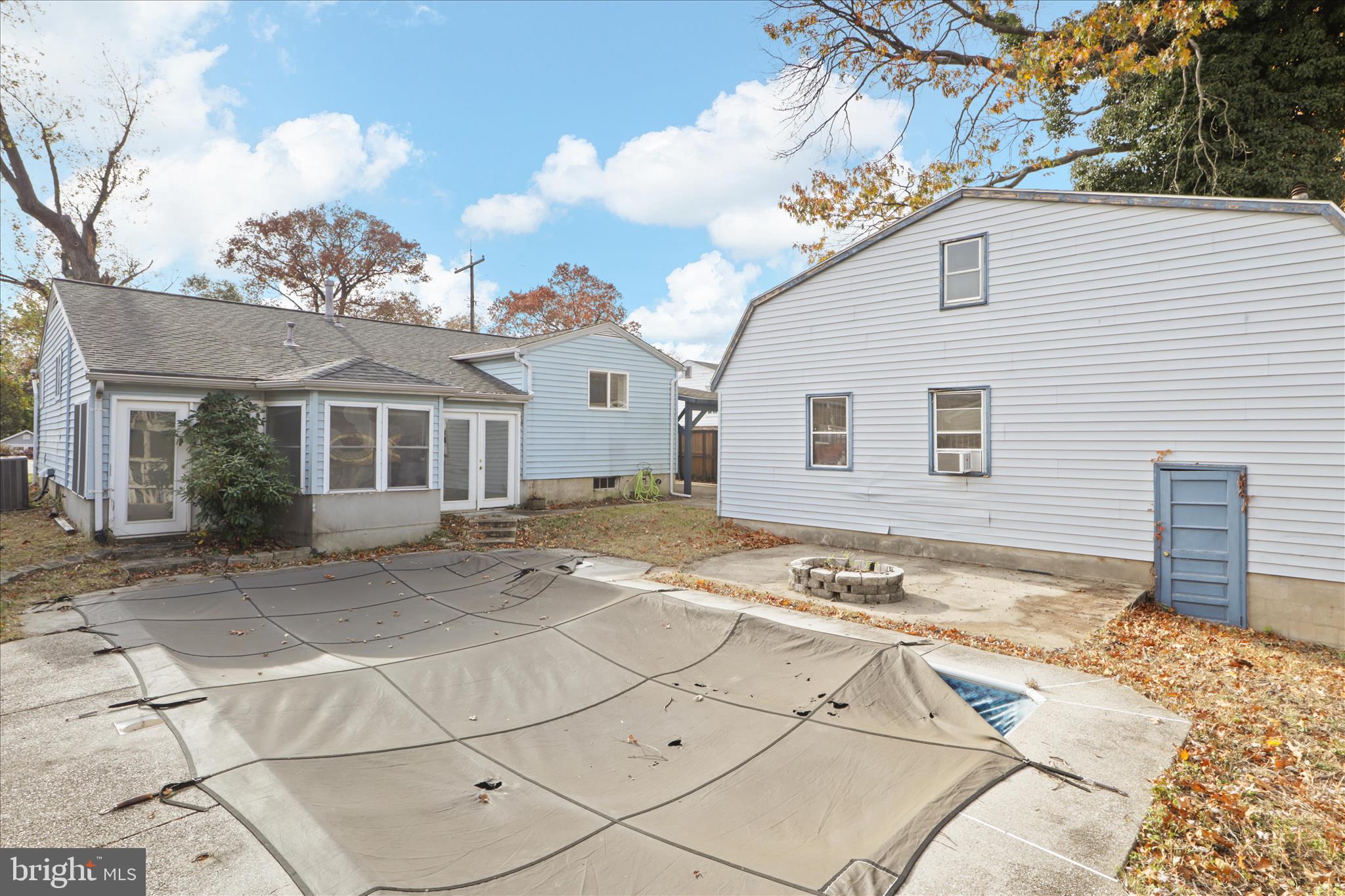 112 Main Avenue Southeast Glen Burnie, MD 21061 - Photo 32 of 45 a view of a white house with a outdoor space
