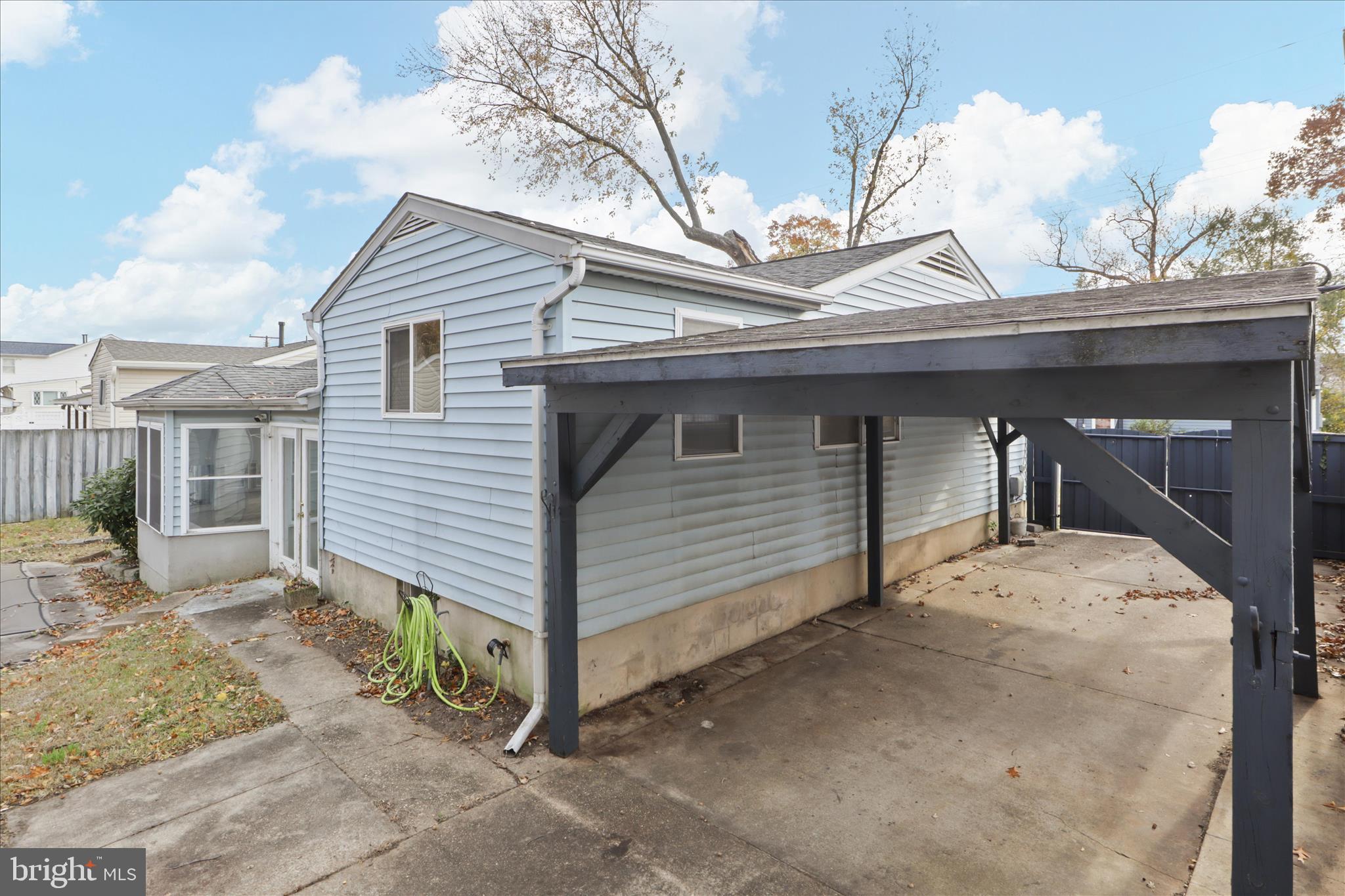 112 Main Avenue Southeast Glen Burnie, MD 21061 - Photo 35 of 45 a view of a house with a snow on the house
