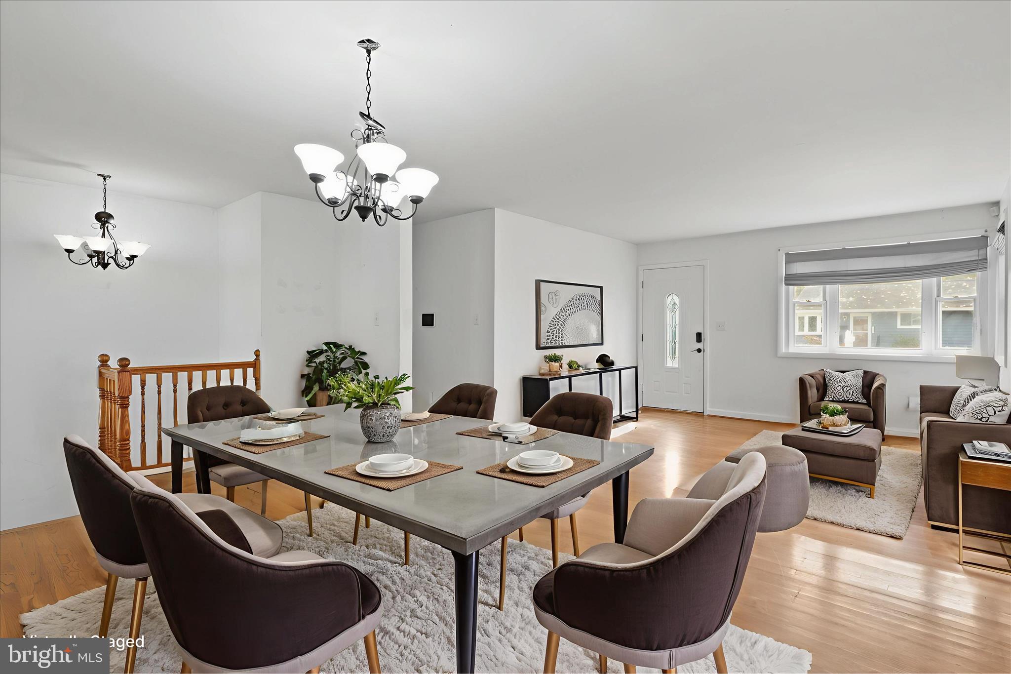 112 Main Avenue Southeast Glen Burnie, MD 21061 - Photo 6 of 45 a view of a dining room with furniture a chandelier and wooden floor