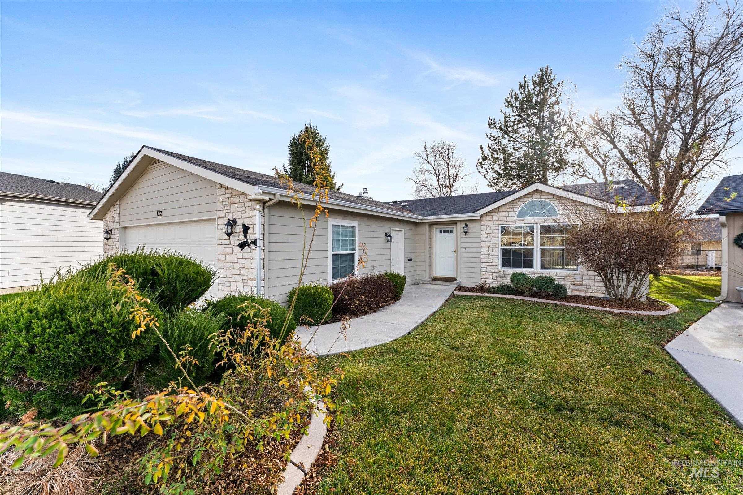 421 South Curtis Road, Unit 122 122 Boise, ID 83705 - Photo 1 of 24 Ranch-style home featuring stone siding and a front lawn