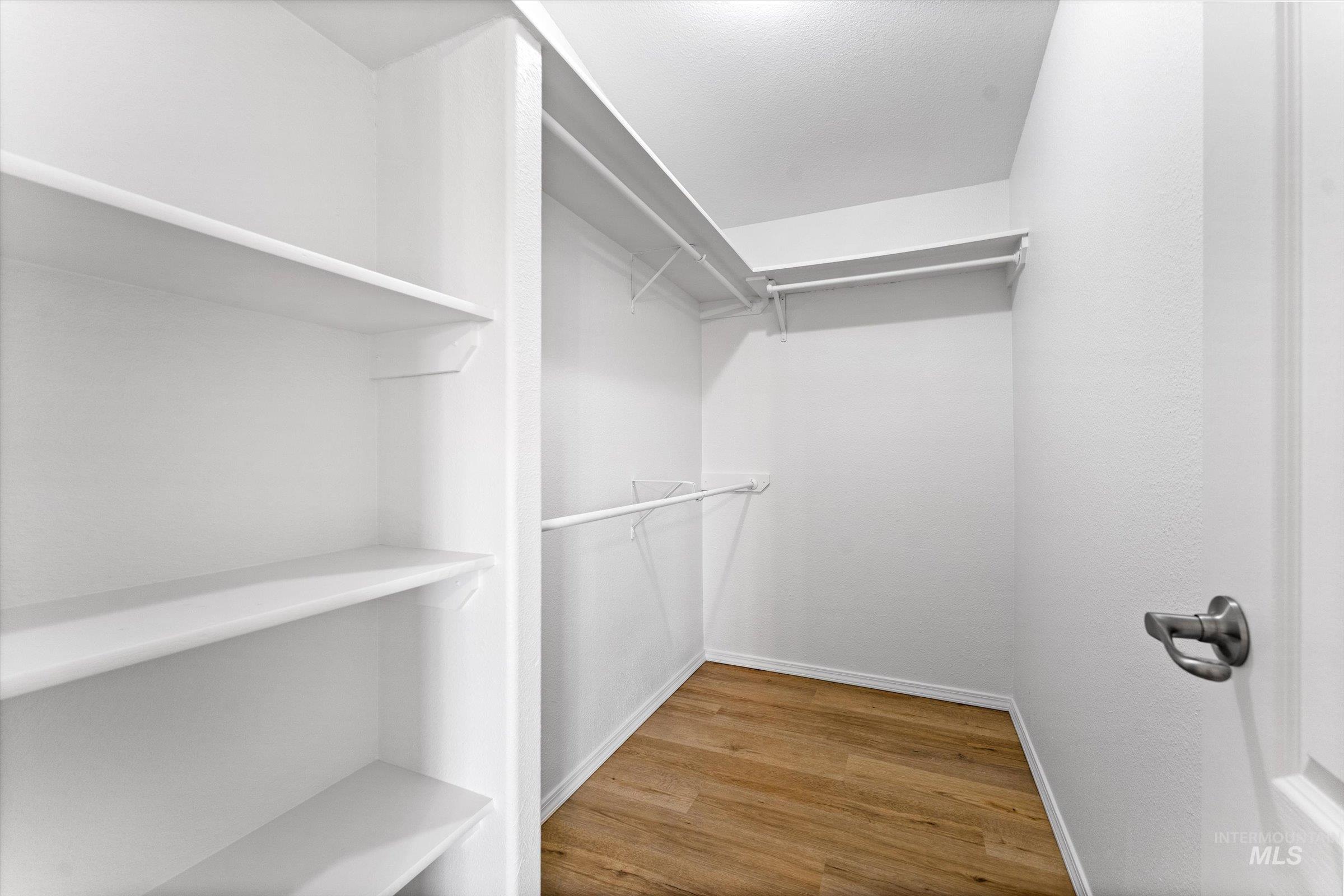 421 South Curtis Road, Unit 122 122 Boise, ID 83705 - Photo 17 of 24 Walk in closet with light wood-type flooring