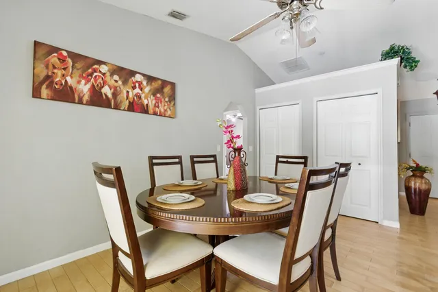 a view of a dining room with furniture