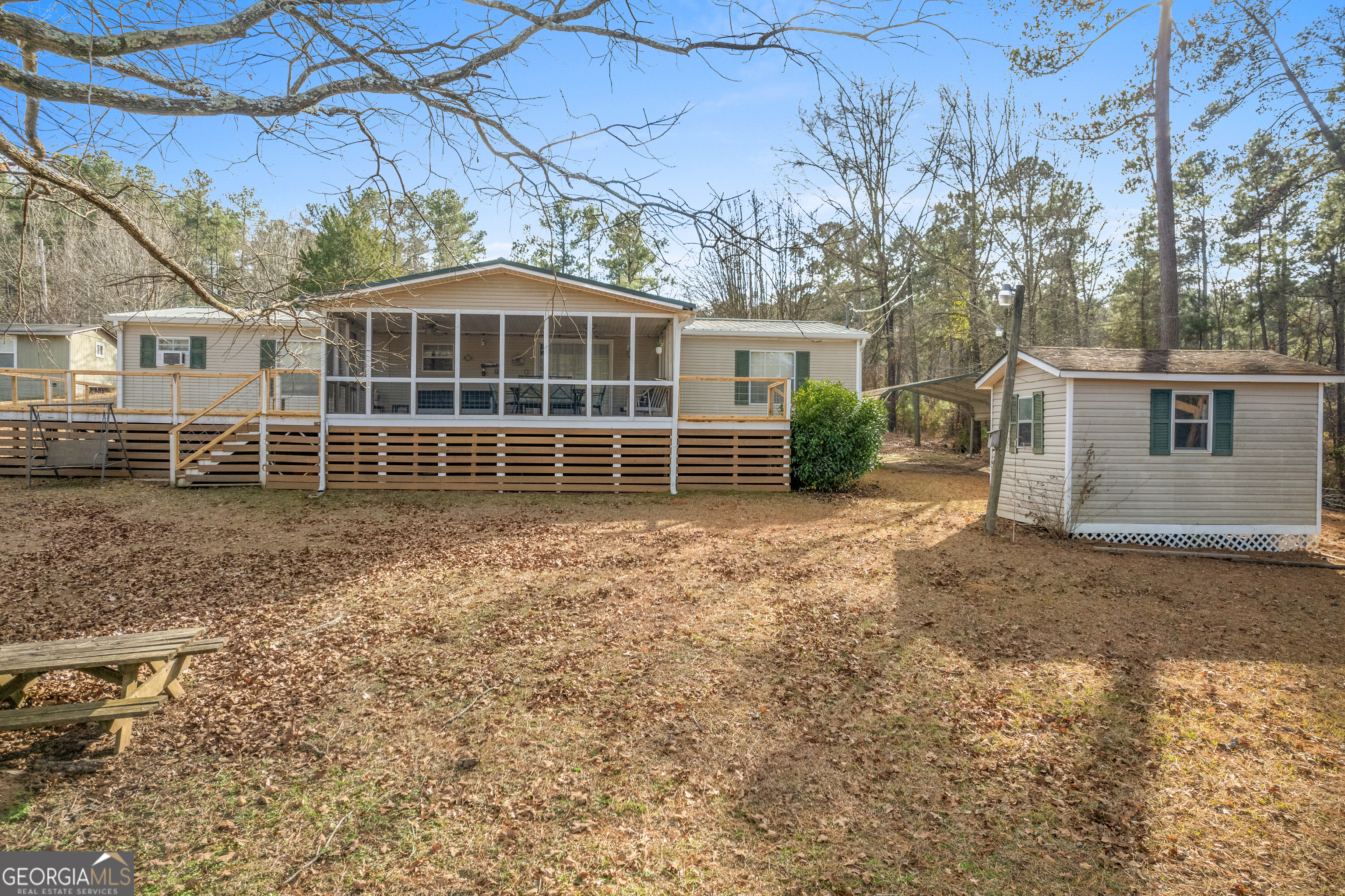 184 Brandywine Run Sparta, GA 31087 - Photo 11 of 72 front view of a house with a yard