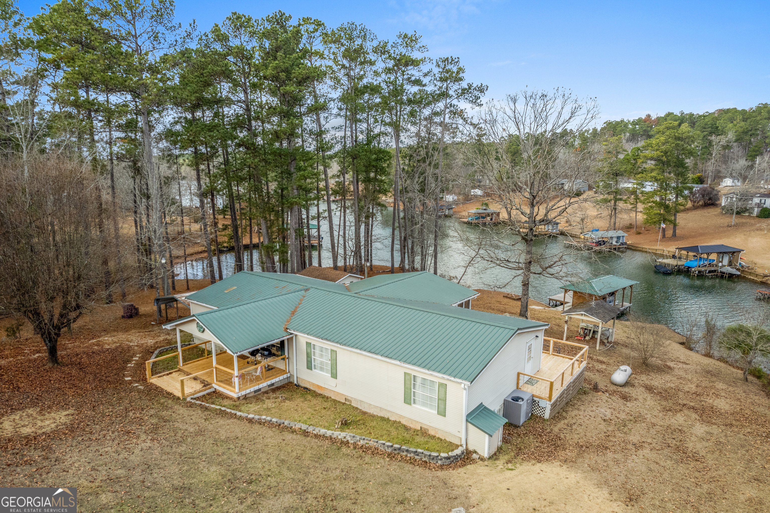 184 Brandywine Run Sparta, GA 31087 - Photo 18 of 72 an aerial view of a house with a yard and lake view