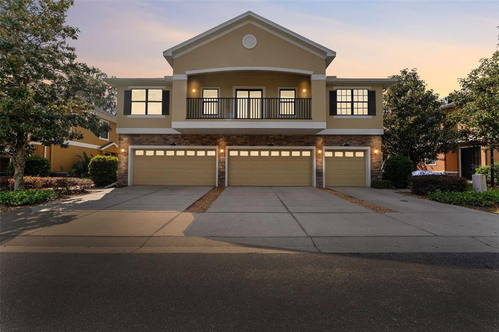 5717 Kingletsound Lithia, FL 33547 - Photo 1 of 1 a front view of a building with garage