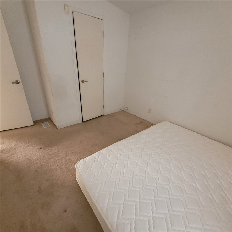 9732 2nd Street Chloride, AZ 86431 - Photo 24 of 28 The property features an interior room with white walls and light-colored carpeting