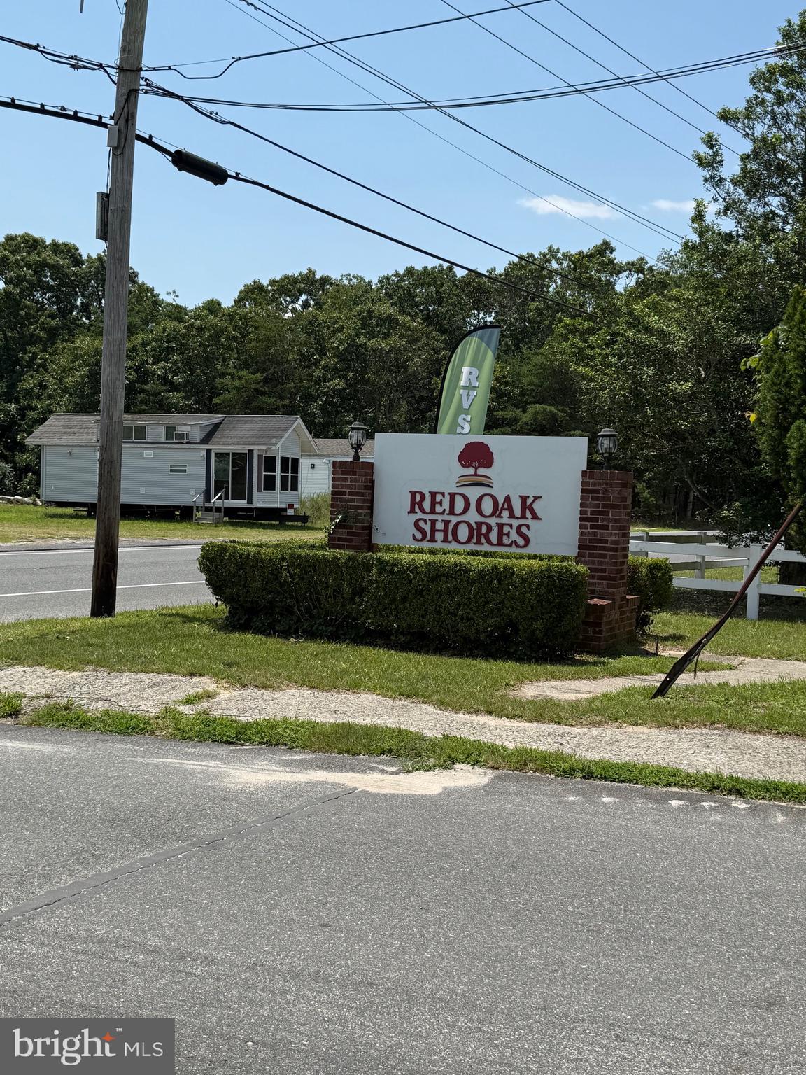 60 Corsons Tavern Road, Unit 248 Ocean View, NJ 08230 - Photo 2 of 18 a view of a house with a yard
