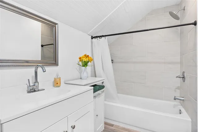 a bathroom with a sink and a bathtub