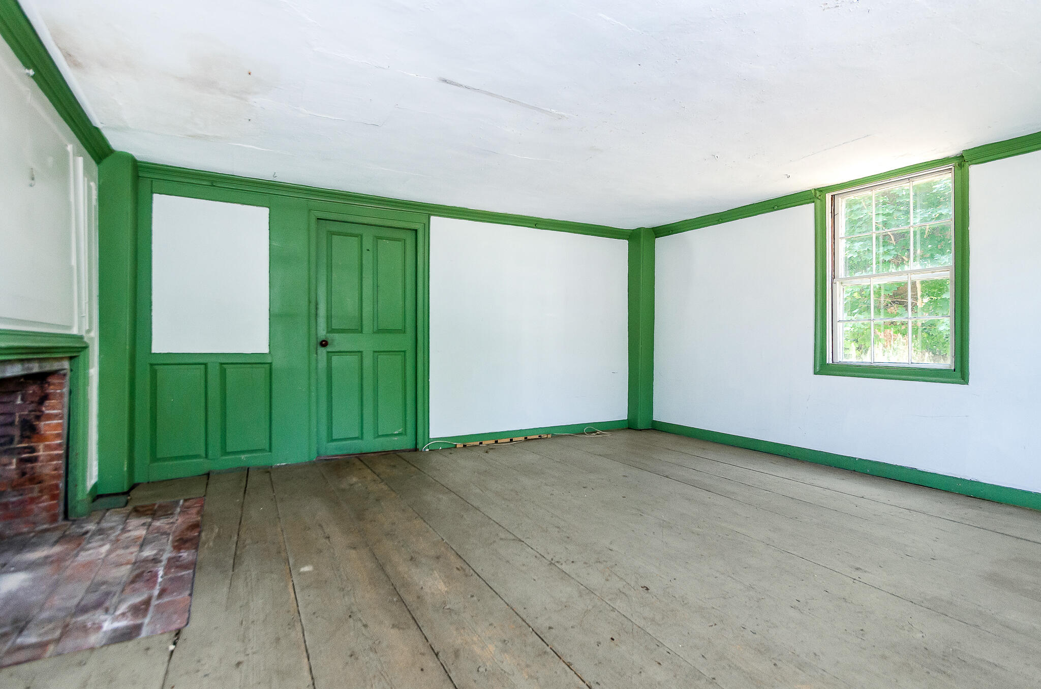 4701 Falmouth Road Cotuit, MA 02635 - Photo 16 of 39 an empty room with closet and a window