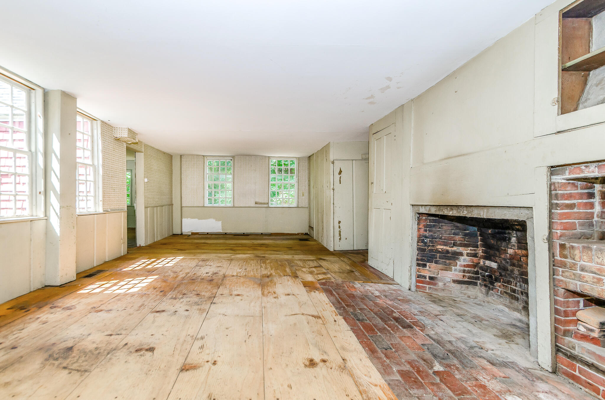 4701 Falmouth Road Cotuit, MA 02635 - Photo 29 of 39 a view of a livingroom with wooden floor and a window