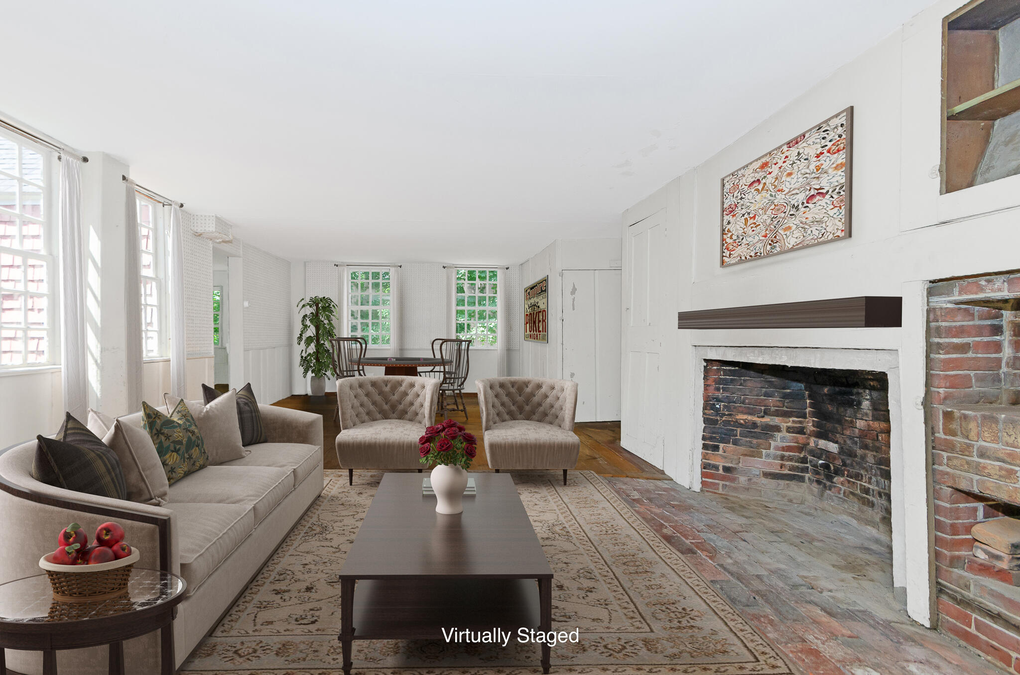 4701 Falmouth Road Cotuit, MA 02635 - Photo 30 of 39 a living room with furniture and a fireplace