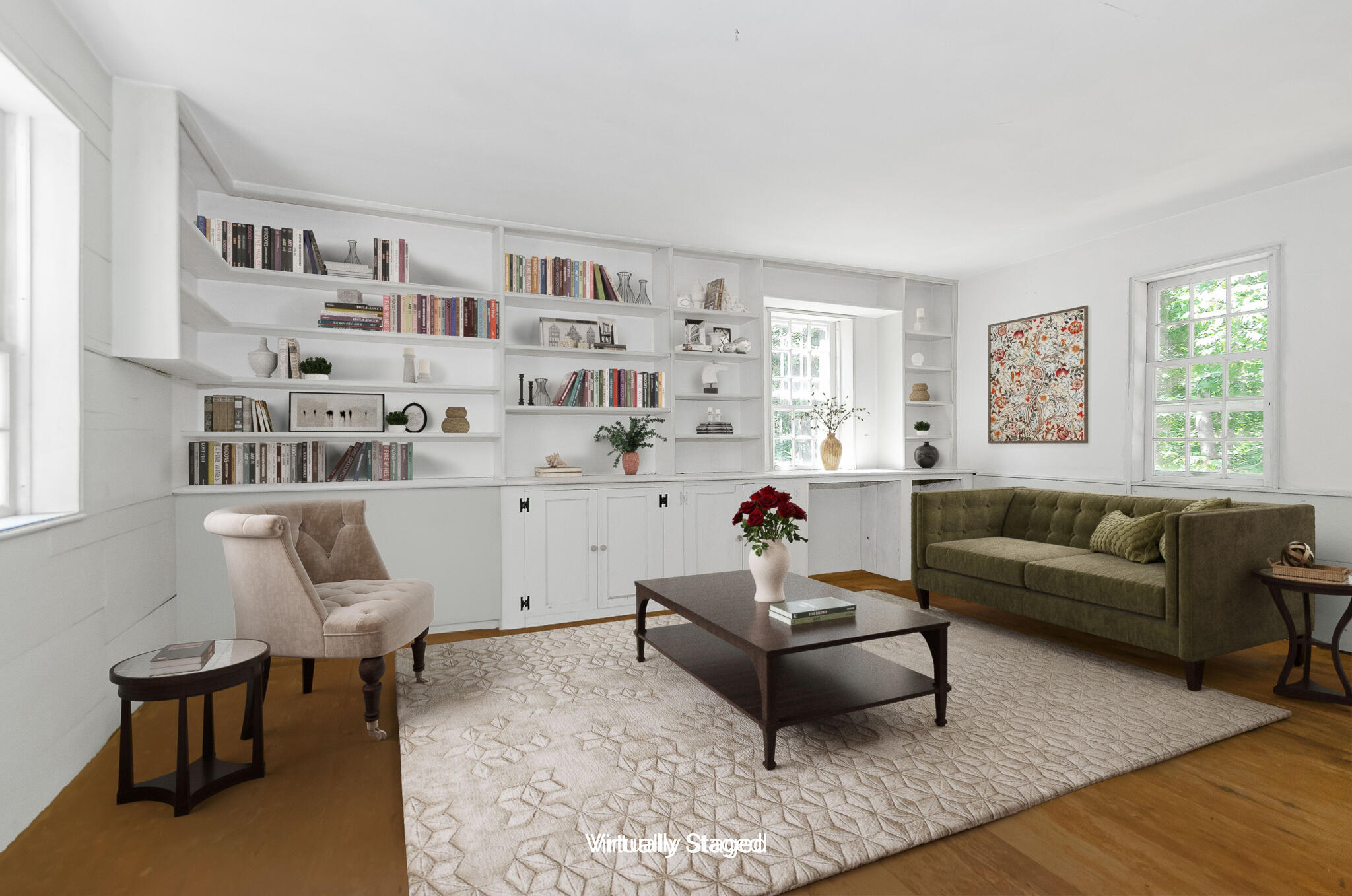 4701 Falmouth Road Cotuit, MA 02635 - Photo 32 of 39 a living room with furniture and a book shelf