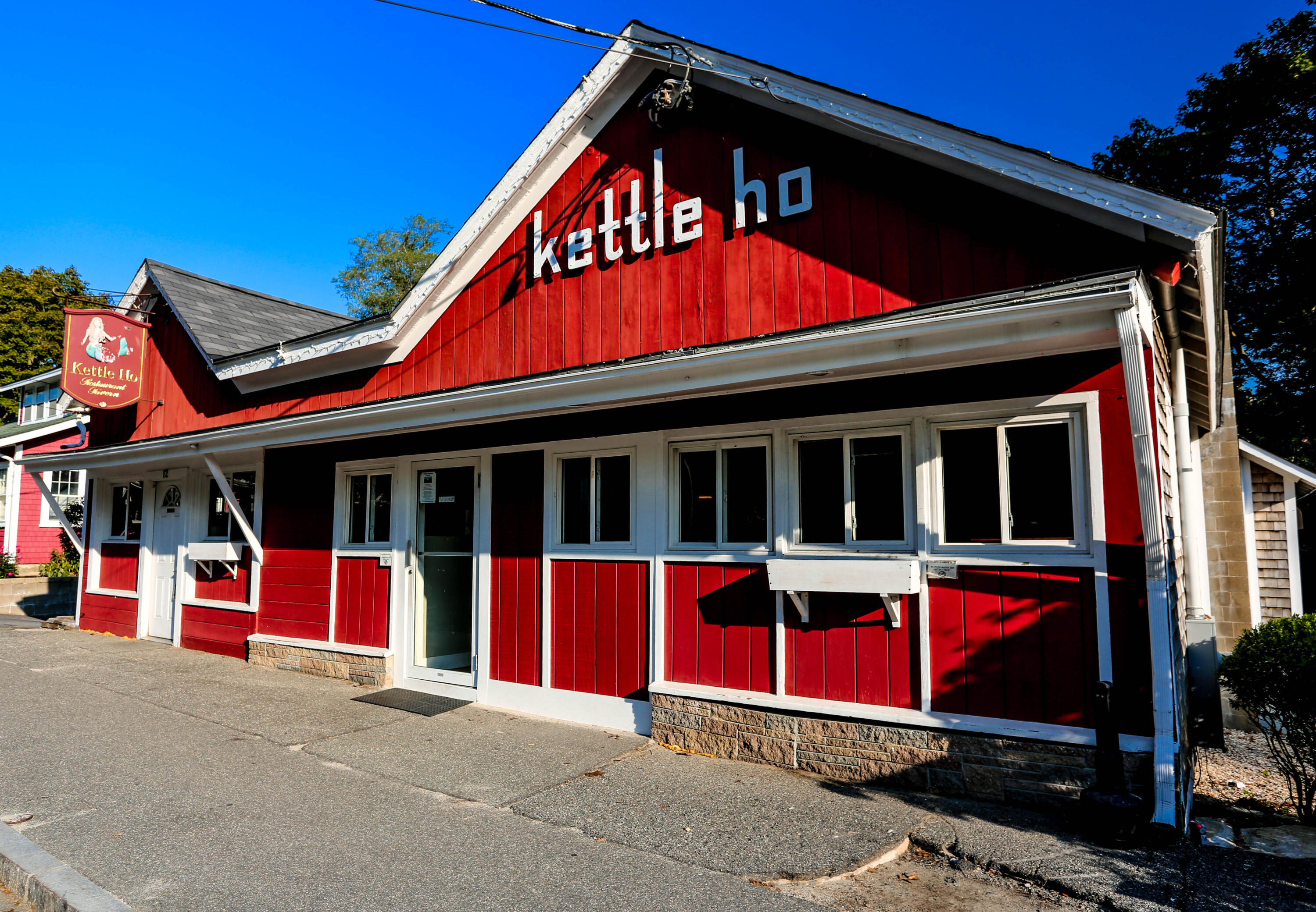 4701 Falmouth Road Cotuit, MA 02635 - Photo 36 of 39 a view of building with red and white walls