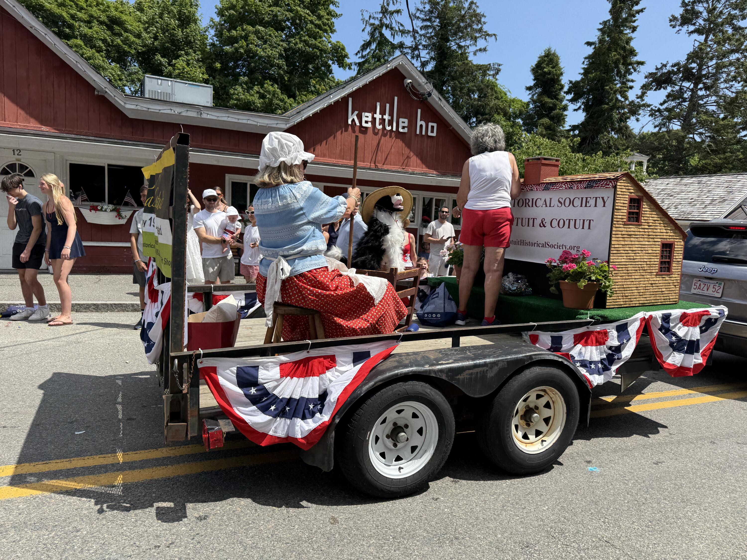 4701 Falmouth Road Cotuit, MA 02635 - Photo 39 of 39 a car parked in front of a store