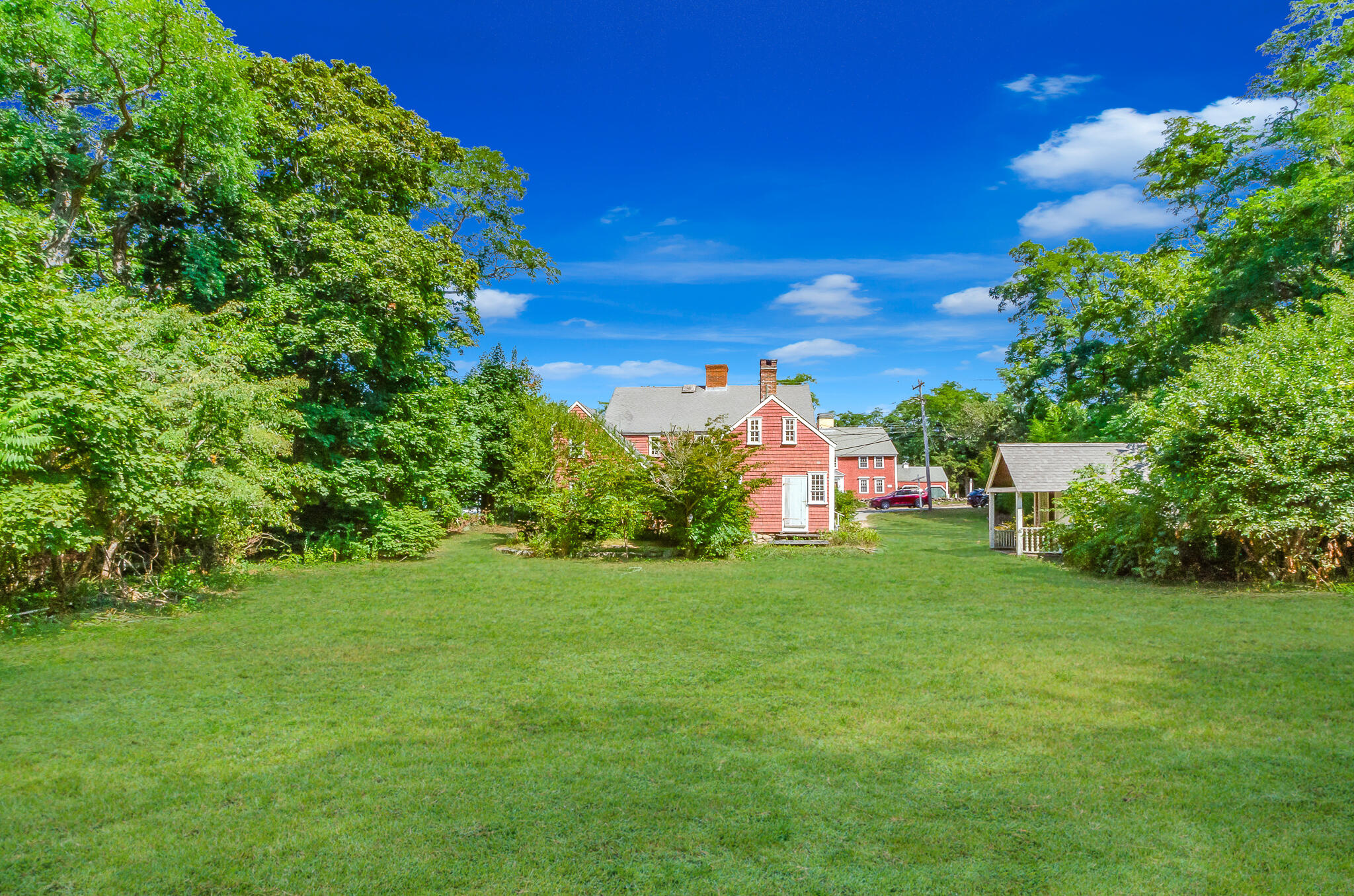 4701 Falmouth Road Cotuit, MA 02635 - Photo 6 of 39 a view of a trees with a big yard