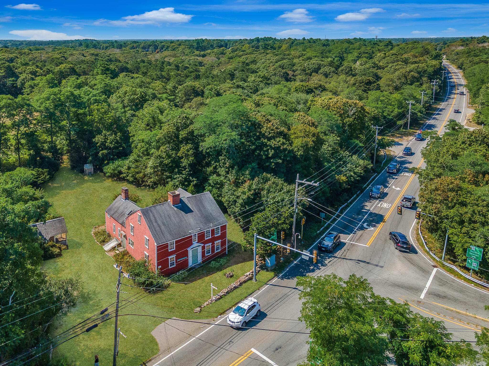 4701 Falmouth Road Cotuit, MA 02635 - Photo 10 of 39 an aerial view of a house with a yard