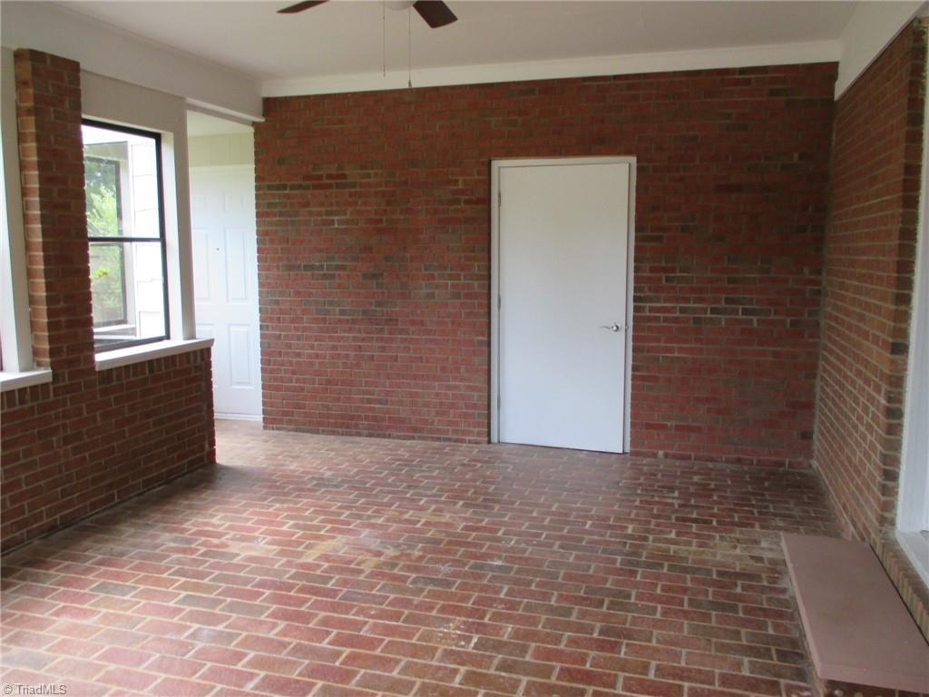 409 Price Road Lexington, NC 27295 - Photo 15 of 30 BRICK SUNROOM (NOT HEATED) DOOR LEADS TO LAUNDRY ROOM