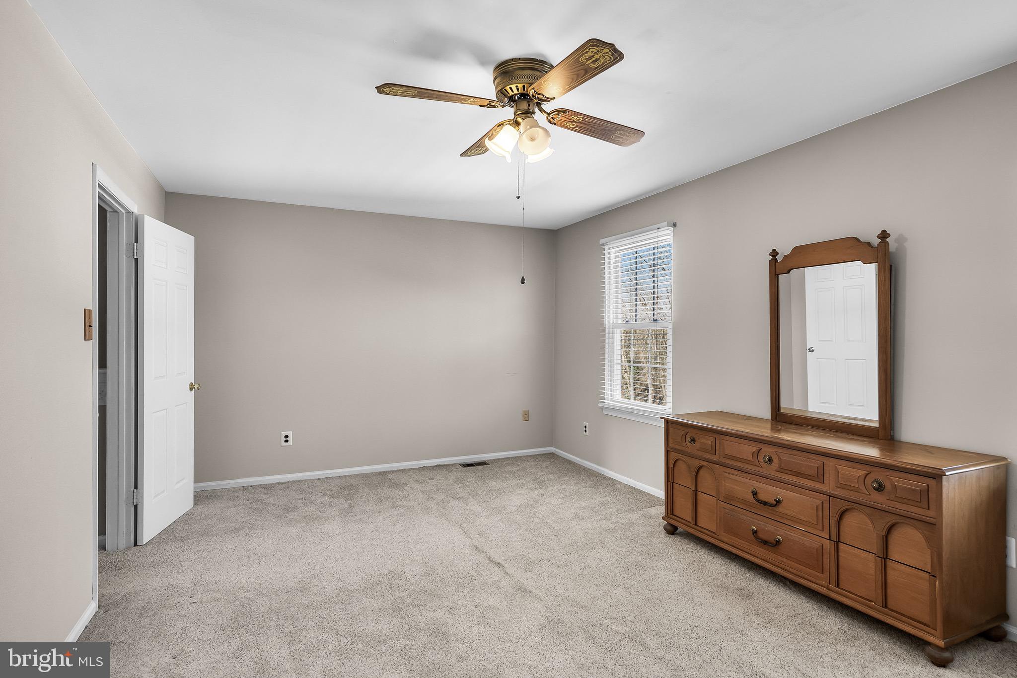 40 Blue Jay Drive Clementon, NJ 08021 - Photo 18 of 27 an empty room with windows and ceiling fan