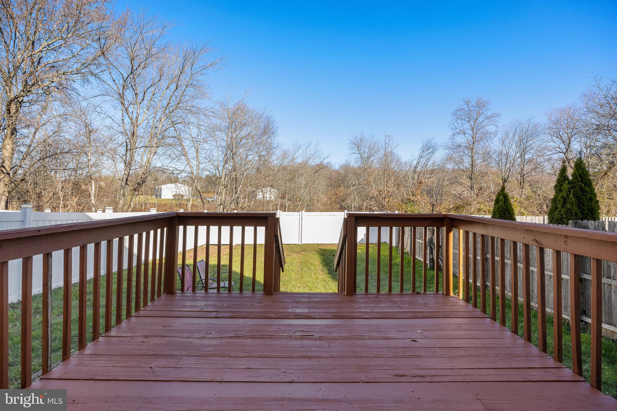 40 Blue Jay Drive Clementon, NJ 08021 - Photo 23 of 27 a view of balcony with wooden floor and fence