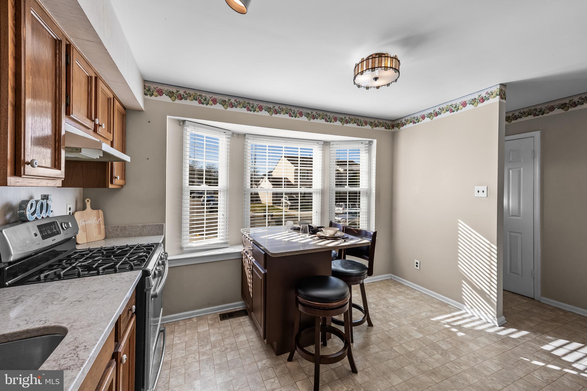 40 Blue Jay Drive Clementon, NJ 08021 - Photo 7 of 27 a view of a kitchen and a window