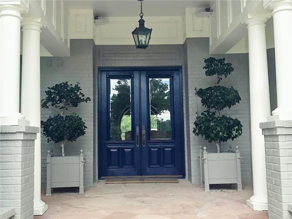 20650 Farm To Market 2154 Navasota, TX 77868 - Photo 16 of 35 a front view of a house with a porch