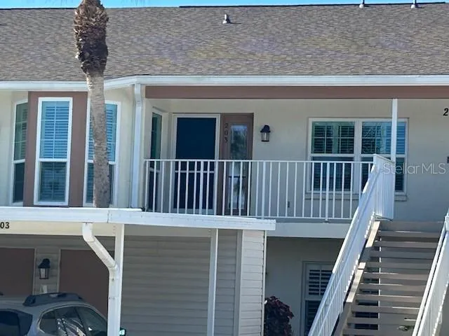 a view of a balcony with staircase