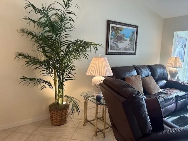 a room that has a chair and a chair in it