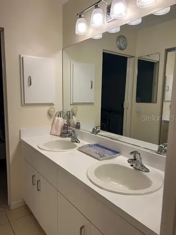 a bathroom with a toilet and shower