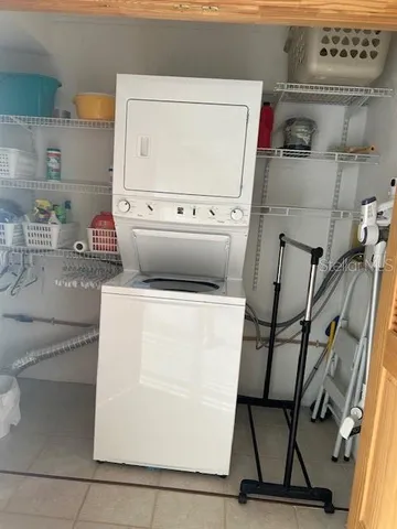 a kitchen with stainless steel appliances a sink and a refrigerator