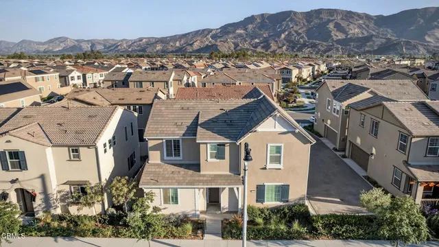 a view of a room with gym equipment and lots of tables
