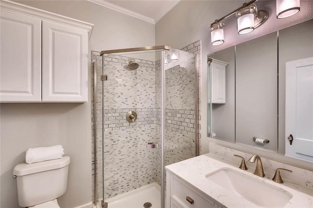 906 East 38th 1/2 Street Austin, TX 78751 - Photo 20 of 28 Bathroom in the hall with stand up shower.