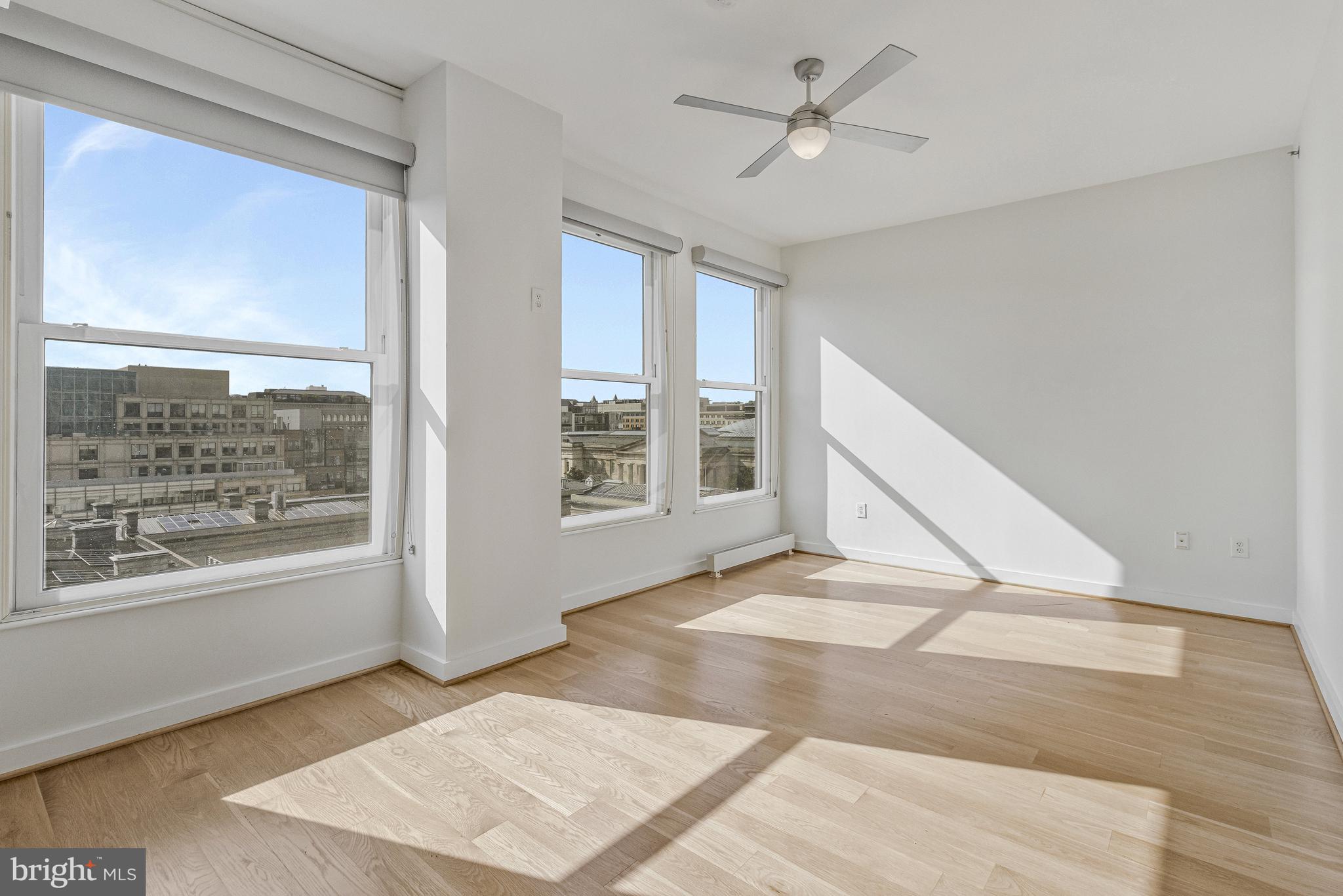 675 E Street Northwest, Unit 900 Washington, DC 20004 - Photo 9 of 40 a view of an empty room with a window