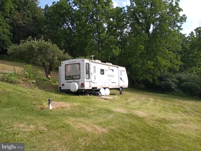 a view of a golf course with a lake