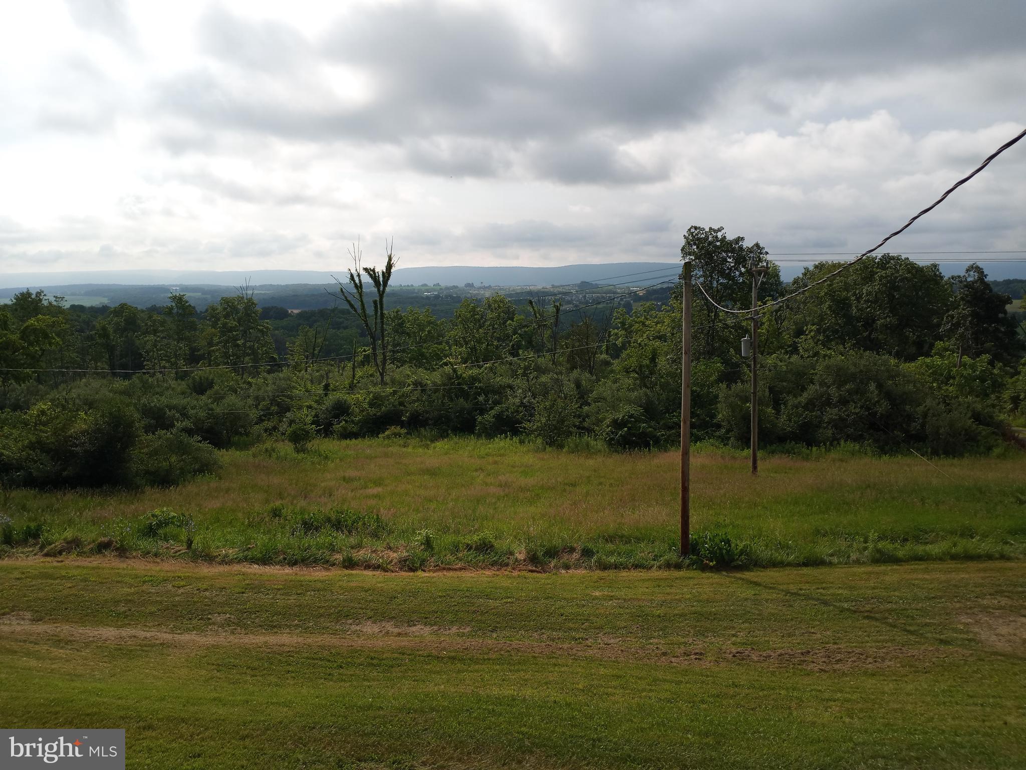 403 Kline Road Bellefonte, PA 16823 - Photo 14 of 27 a view of a golf course with a lake