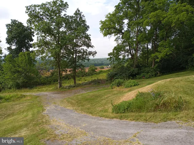 a view of a lake with a big yard