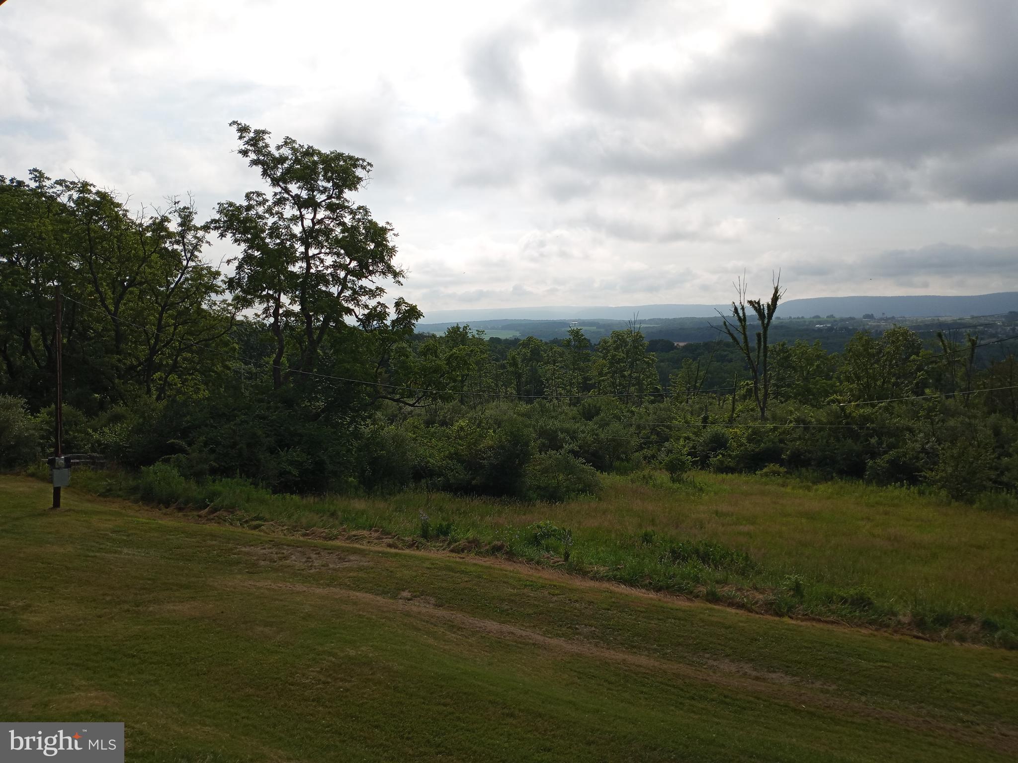 403 Kline Road Bellefonte, PA 16823 - Photo 16 of 27 a view of a lake with a big yard