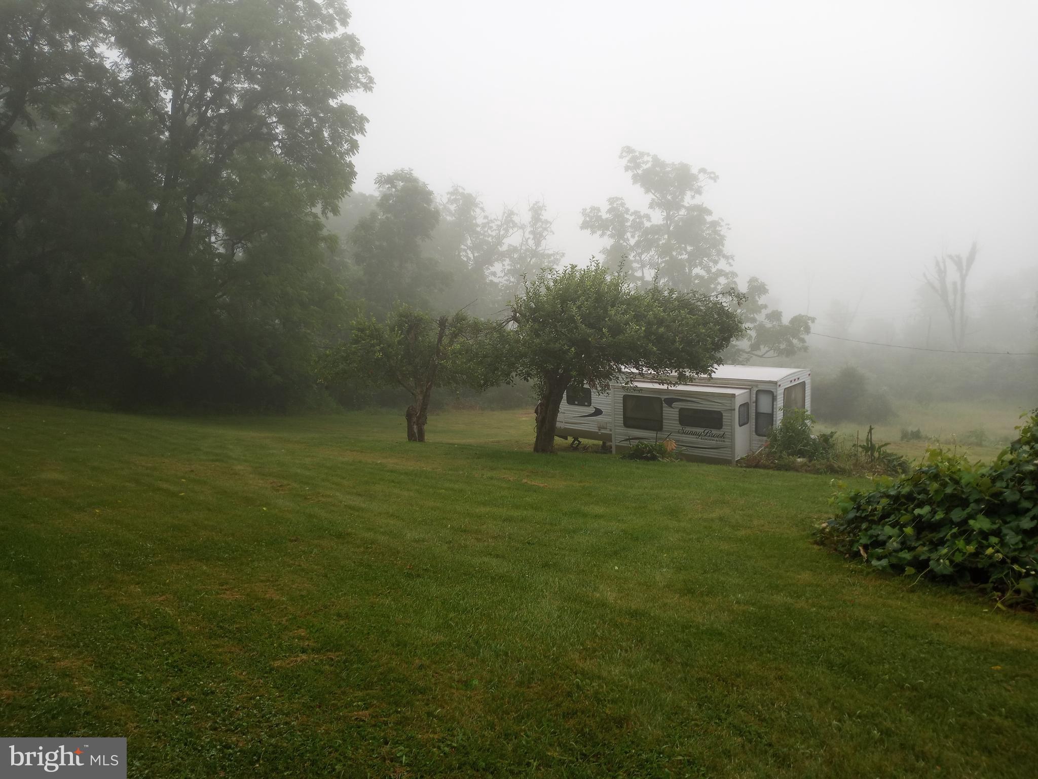 403 Kline Road Bellefonte, PA 16823 - Photo 25 of 27 a view of a house with a backyard