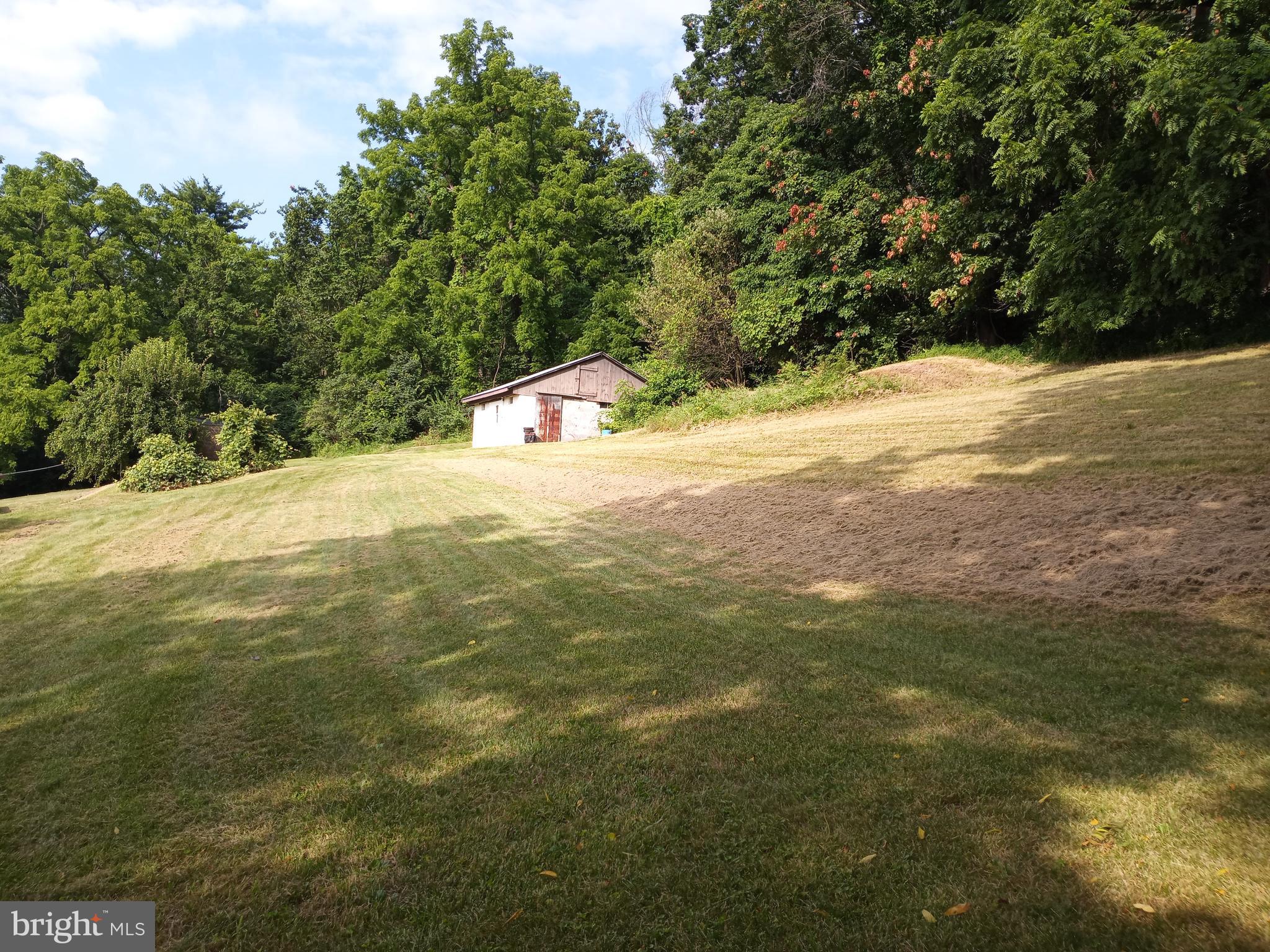 403 Kline Road Bellefonte, PA 16823 - Photo 4 of 27 a view of a yard with a tree