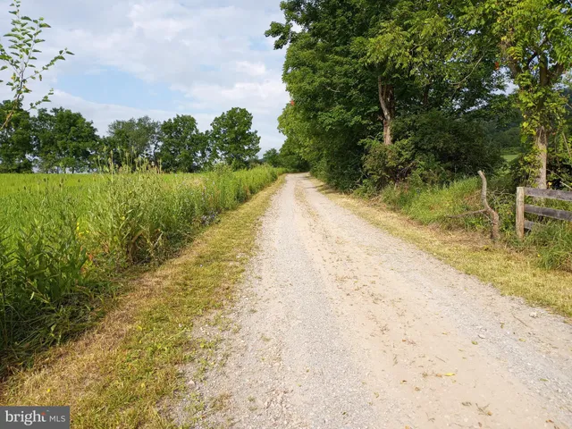 a view of lake with green space
