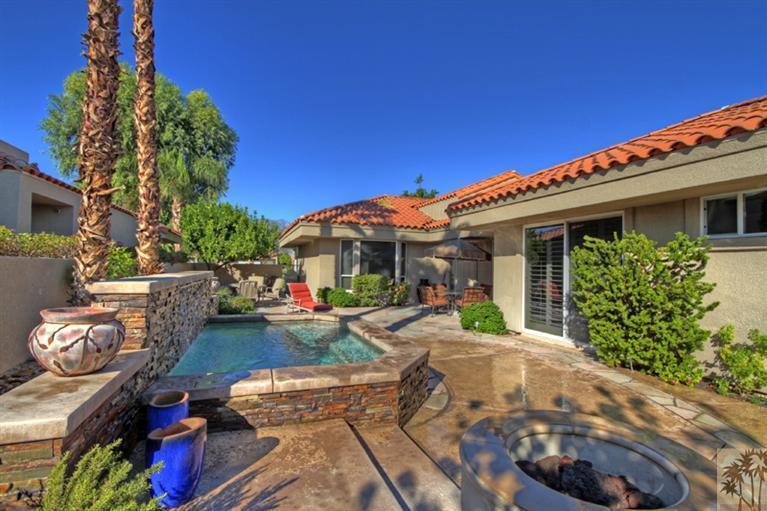 41 Augusta Drive Rancho Mirage, CA 92270 - Photo 2 of 25 a view of a house with backyard sitting area and furniture