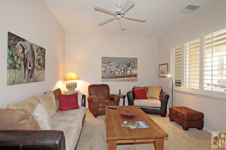 41 Augusta Drive Rancho Mirage, CA 92270 - Photo 11 of 25 a living room with furniture a rug and a window
