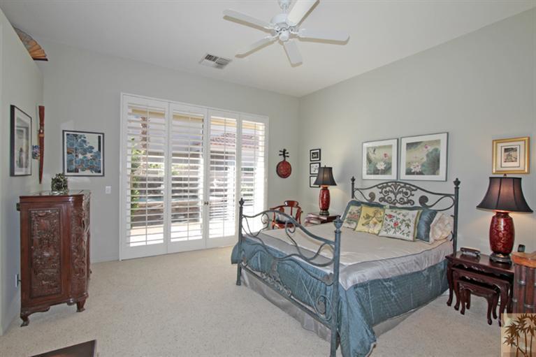 41 Augusta Drive Rancho Mirage, CA 92270 - Photo 16 of 25 a living room with furniture and a window