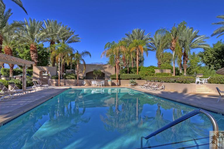 41 Augusta Drive Rancho Mirage, CA 92270 - Photo 25 of 25 a swimming pool with outdoor seating and yard